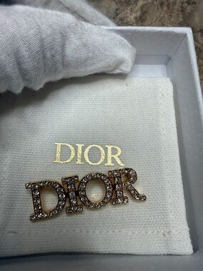Dior Gold Logo Pin with Clear Crystals
